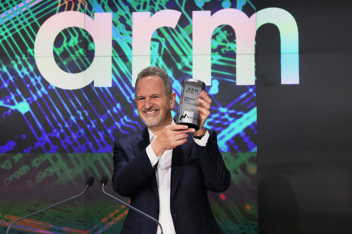 Arm Holdings CEO Rene Haas poses with the Opening Bell Crystal at the Nasdaq MarketSite on September 14, 2023 in New York City. Arm, the chip design firm that supplies core technology to companies that include Apple and NVidia, priced its initial public offering at $51 a share.