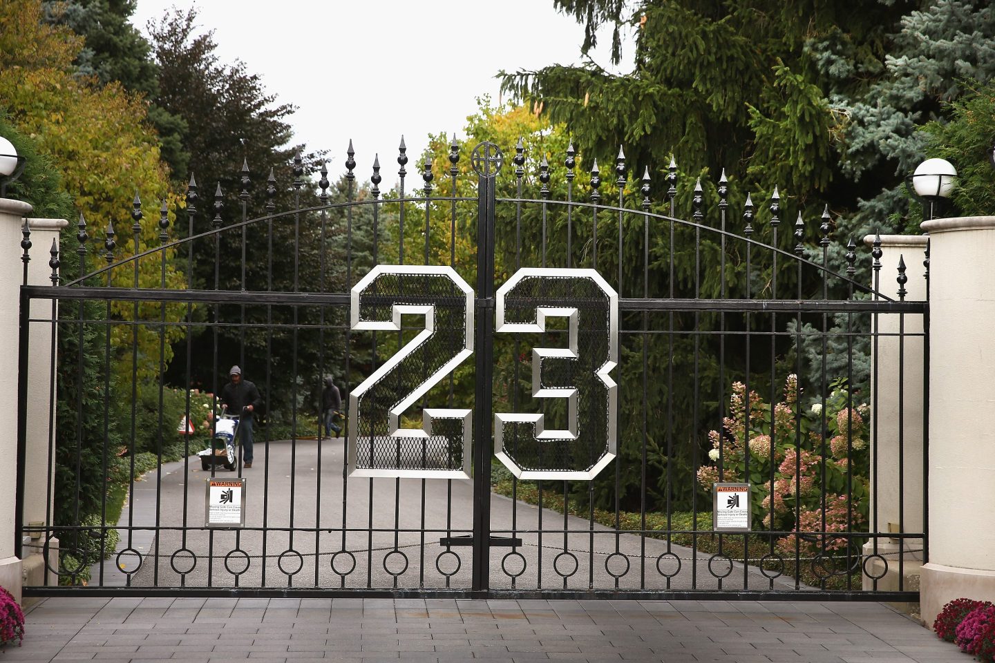 A gate with the number 23 marks the entrance of Michael Jordan's mansion.