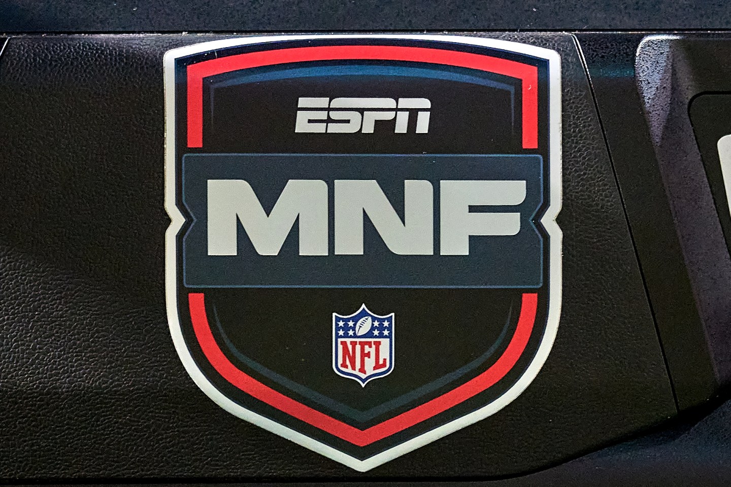 A close up shot shows the NFL Monday Night Football logo.