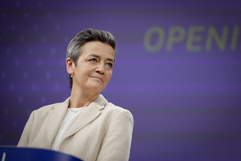 a woman standing up on a podium