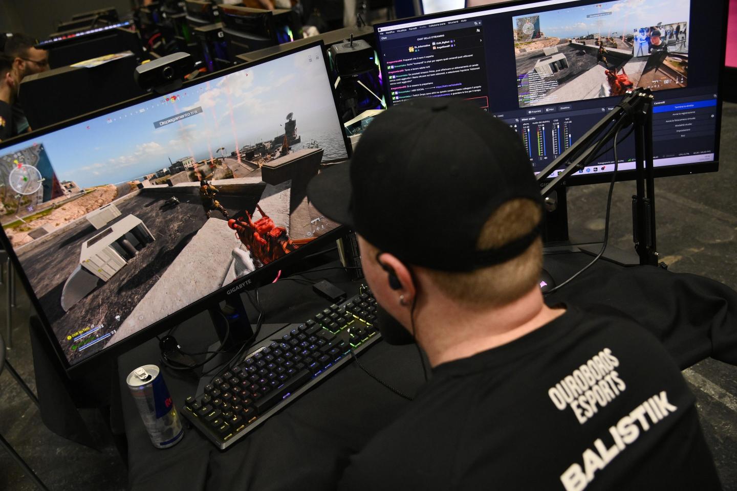 Boy plays the shooter video game Call of Duty