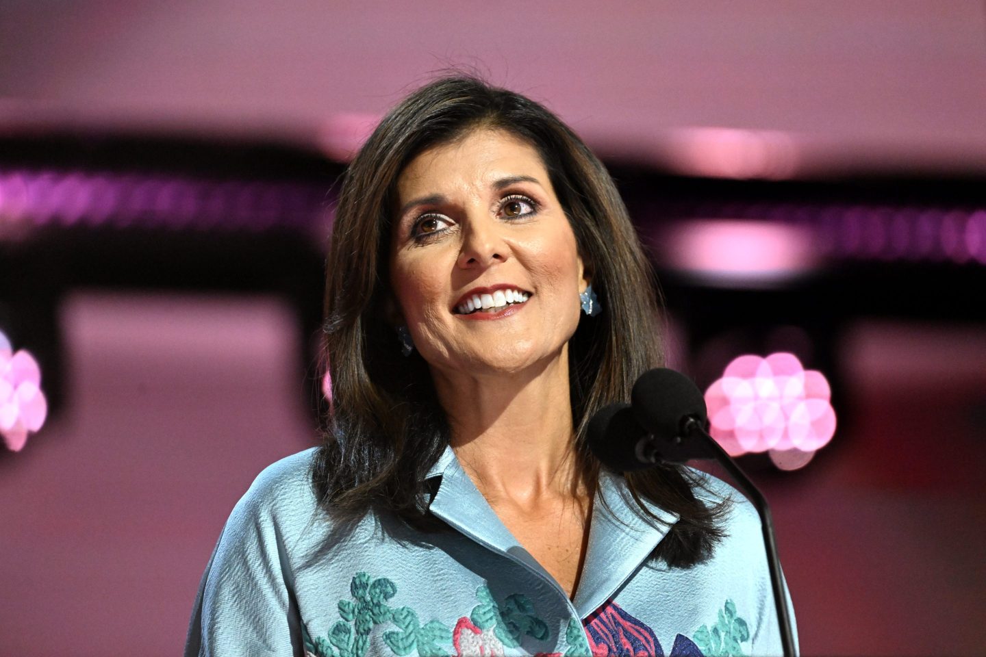 Nikki Haley smiles on the Republican National Convention stage