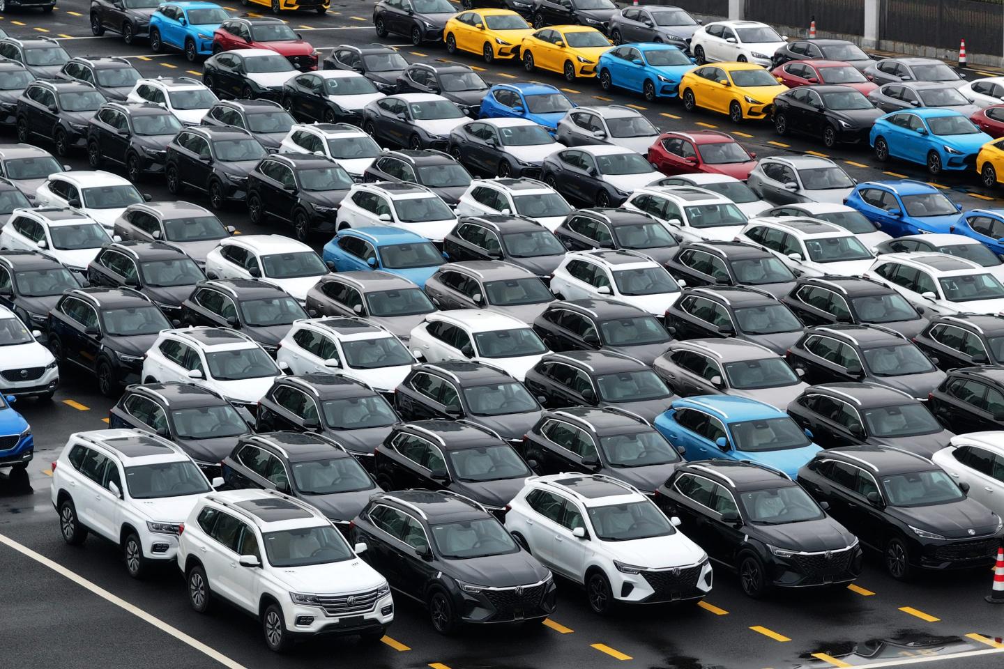 Aerial view of MG new energy vehicles waiting to be loaded onto a ro-ro ship for export
