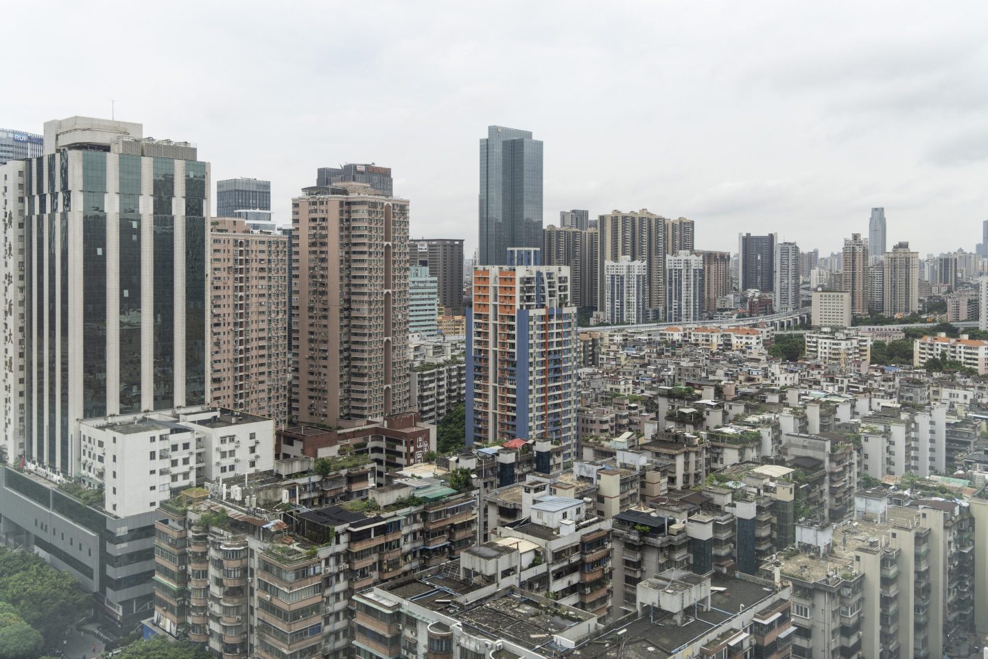 General view of residential and commercial buildings in Guangzhou, China. Guangzhou is one of three cities that announced reduced restrictions for property purchases over the weekend.