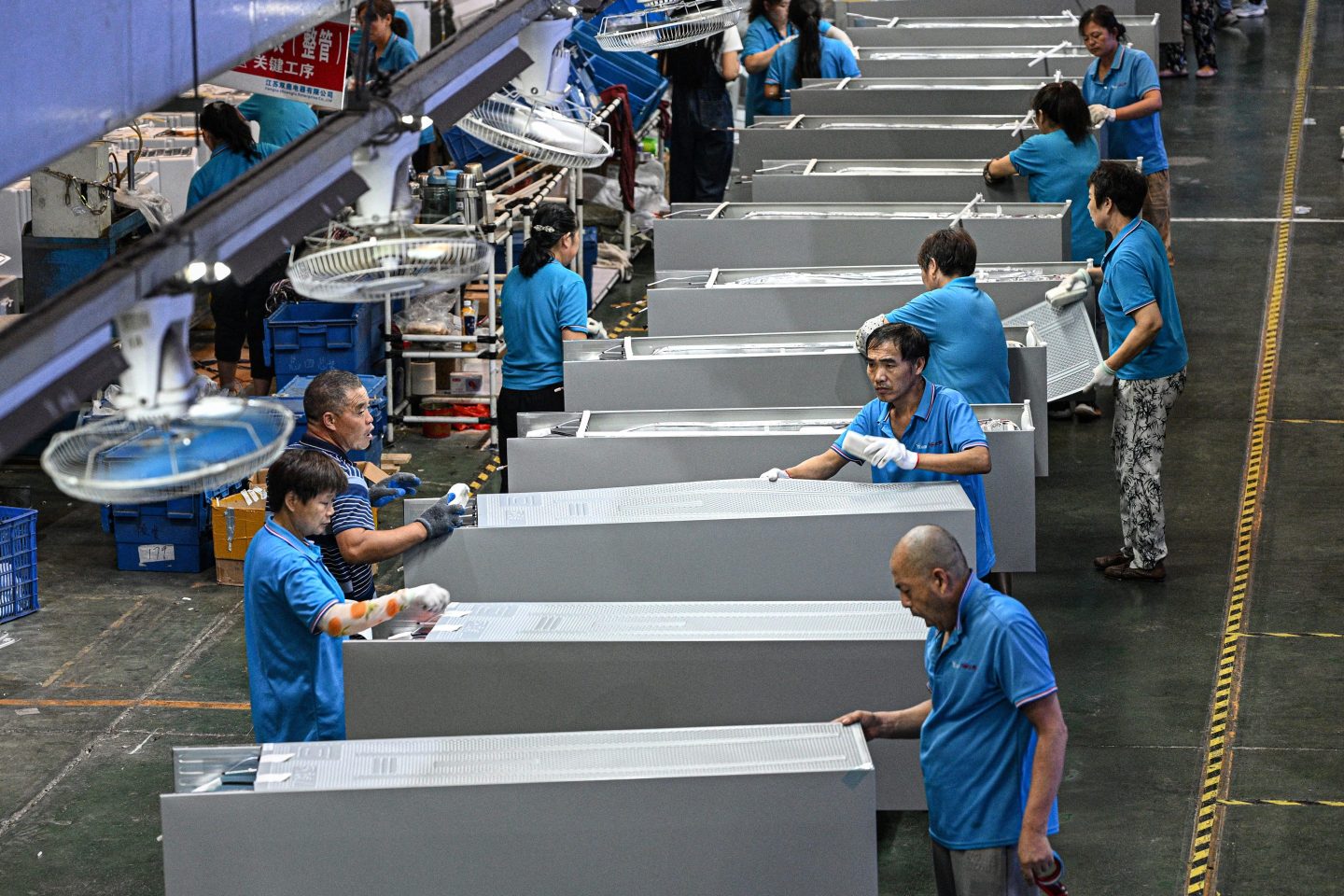 factory workers on assembly line