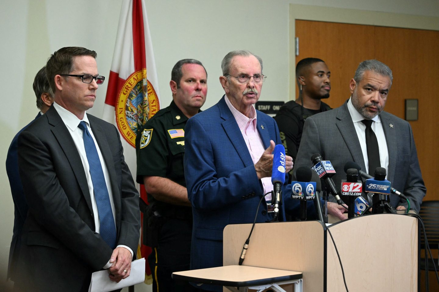 Law enforcement officials brief reporters on the assassination attempt on Donald Trump in Florida on Sunday.