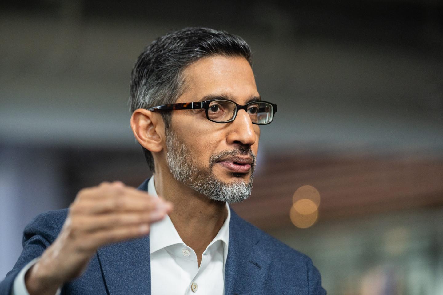 Sundar Pichai, chief executive officer of Alphabet Inc. appears mid-speech.