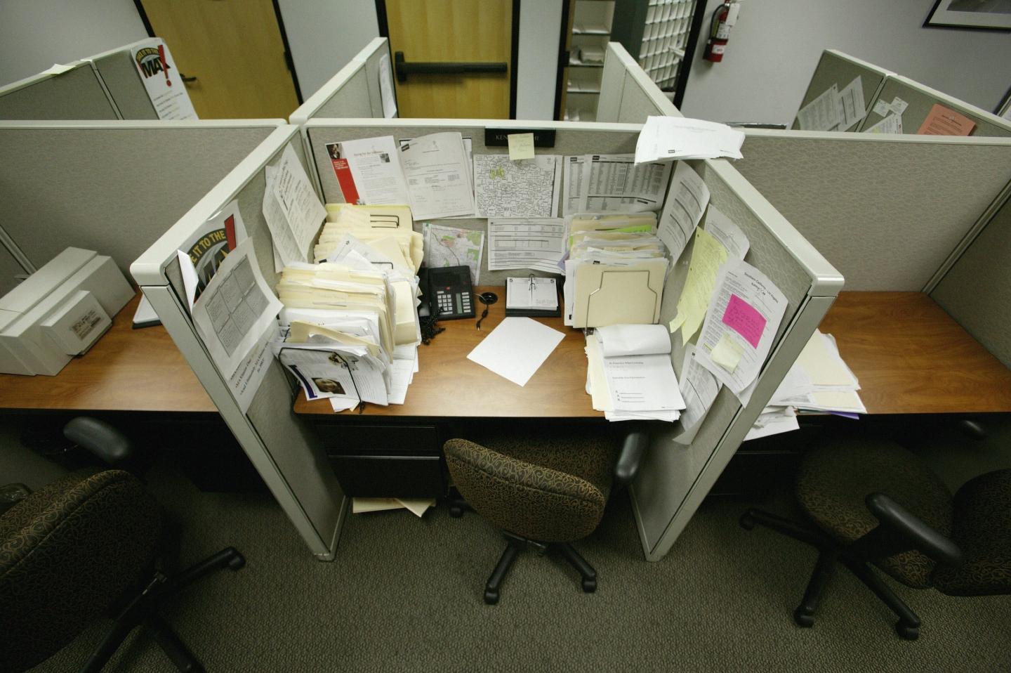 Empty office cubicles.