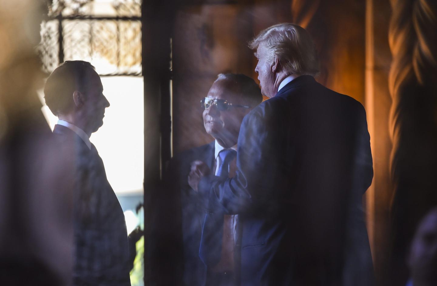 : President-elect Donald Trump meets with chief-of-staff designate Reince Priebus, left, and Isaac "Ike" Perlmutter, CEO of Marvel Entertainment, center, during transition meetings at  Mar-a-Lago in 2016.