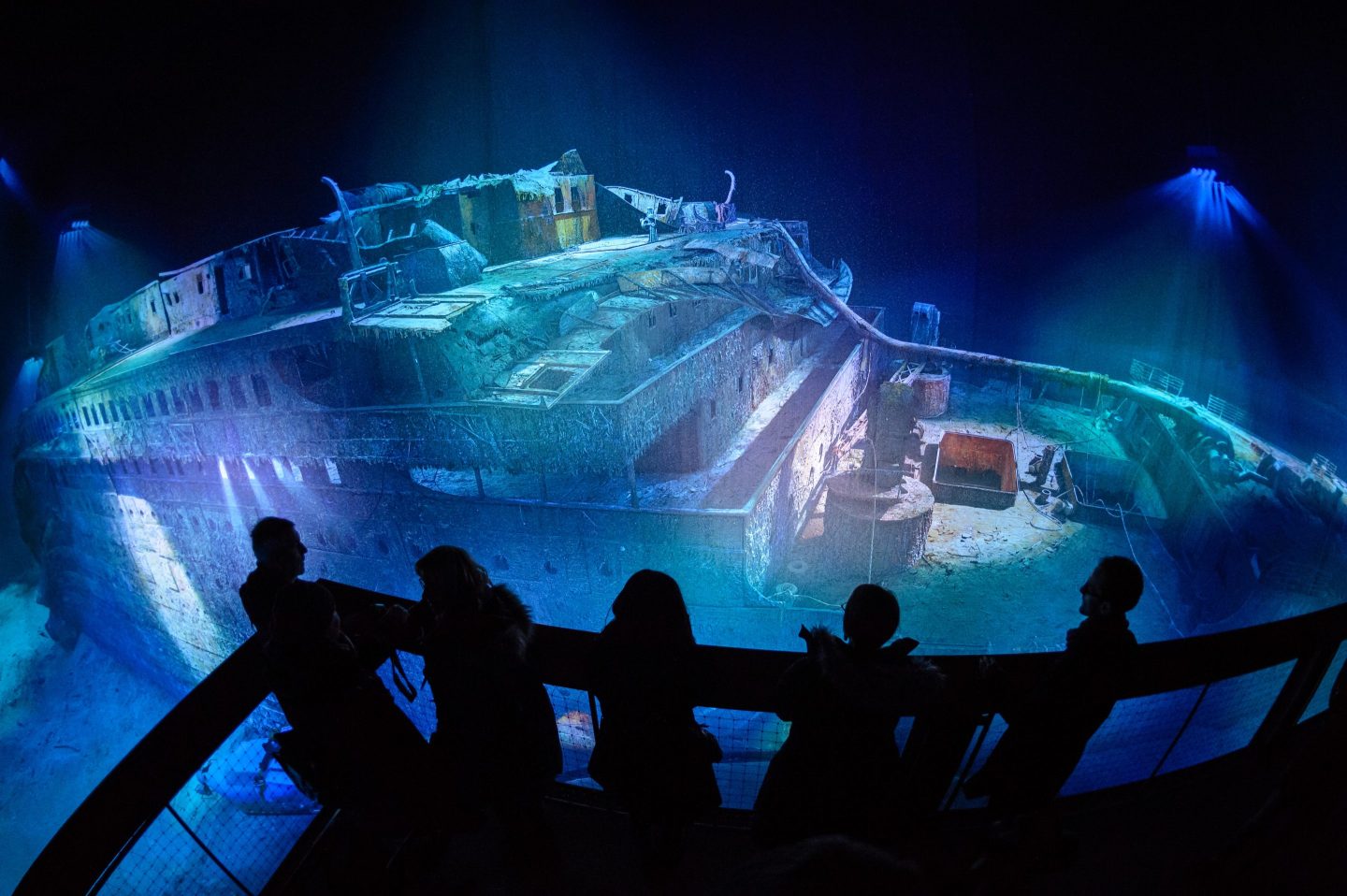 People look at a large-scale 360 degree panorama presentation of the Titanic shipwreck by artist Yadegar Asisi