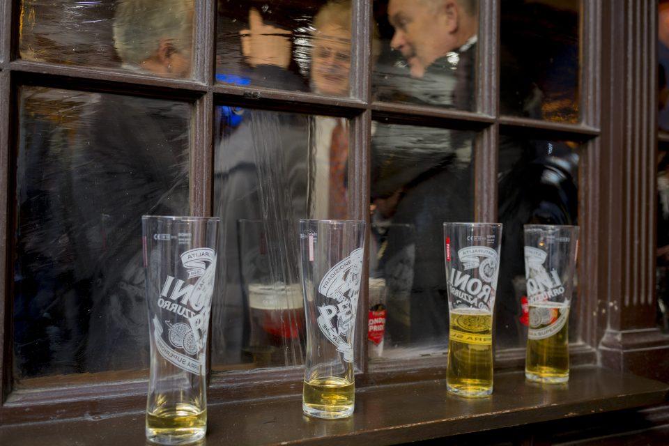 Nearly empty beer glasses in the City of London.