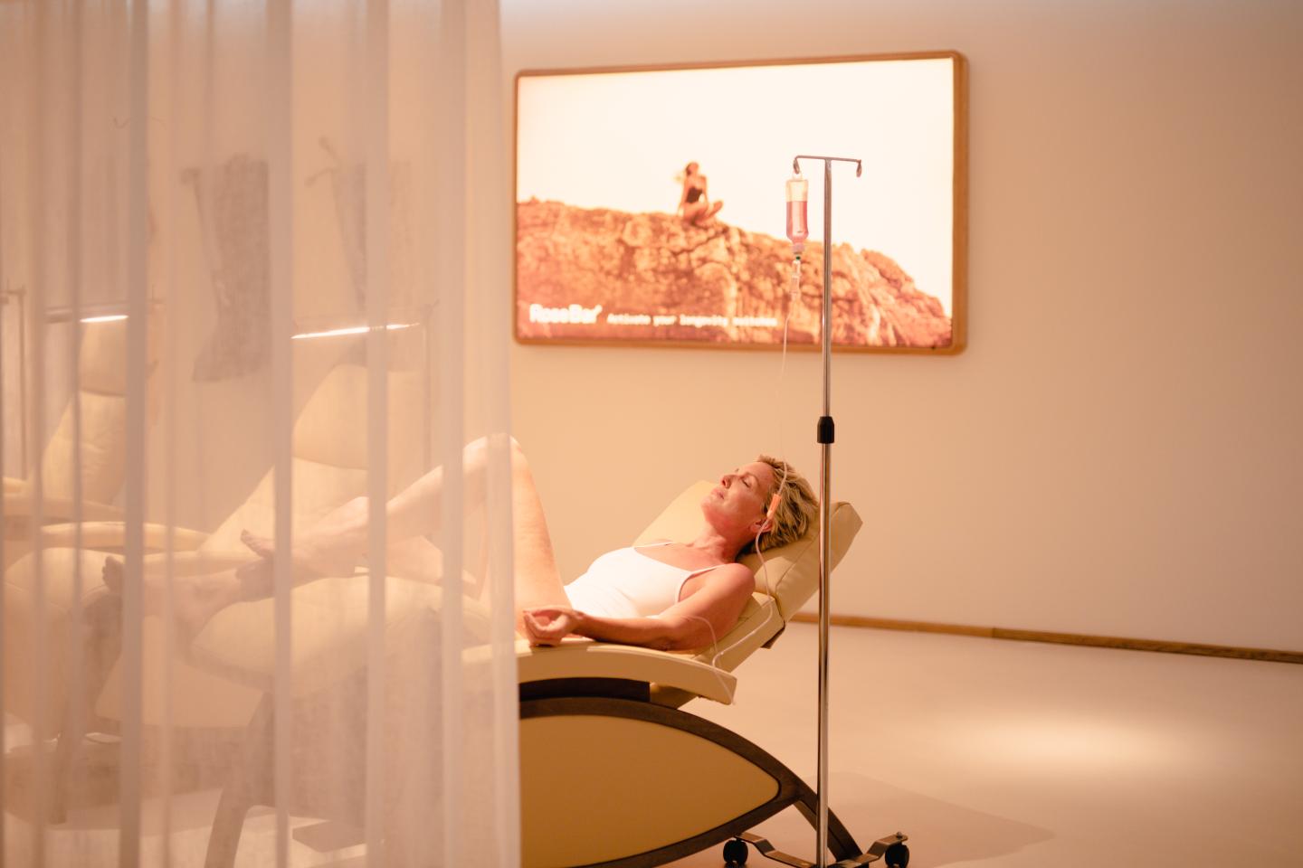 On vacation, a guest gets an IV infusion at wellness resort Six Senses Ibiza, as the longevity tourism market rapidly expands.