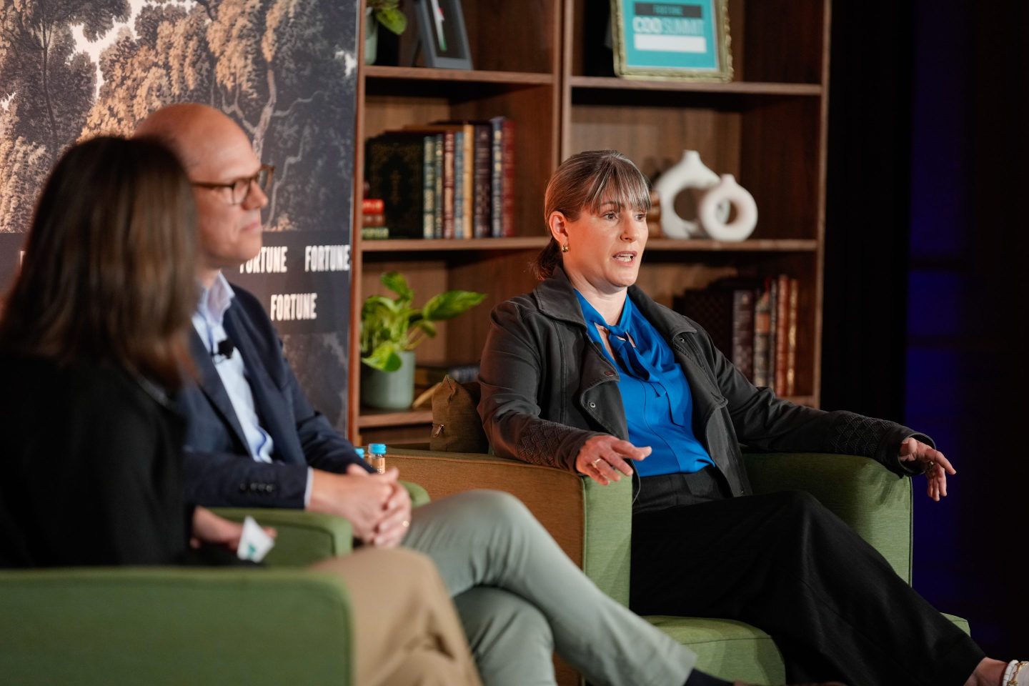 Google DeepMind director of strategic initiatives, Terra Terwilliger, speaking onstage at Coins2Day's COO Summit.