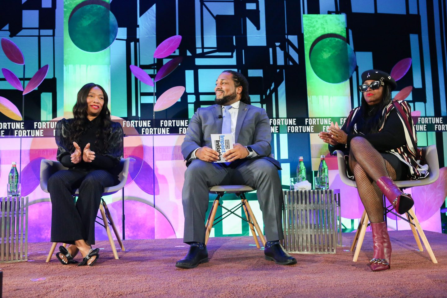 From left: Tatiana Davenport, Greg Jackson Jr., and Edna Marshall discuss gun violence prevention at the Fortune Impact Initiative in Atlanta.