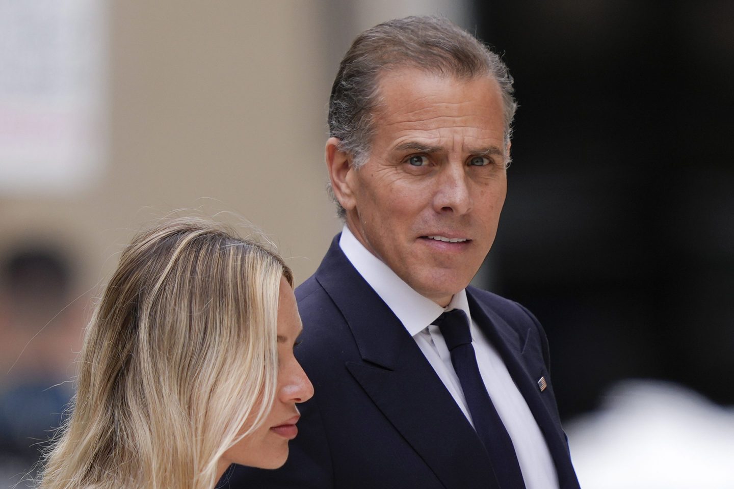 Hunter Biden, accompanied by his wife, Melissa Cohen Biden, arrives at federal court, June 11, 2024, in Wilmington, Del.