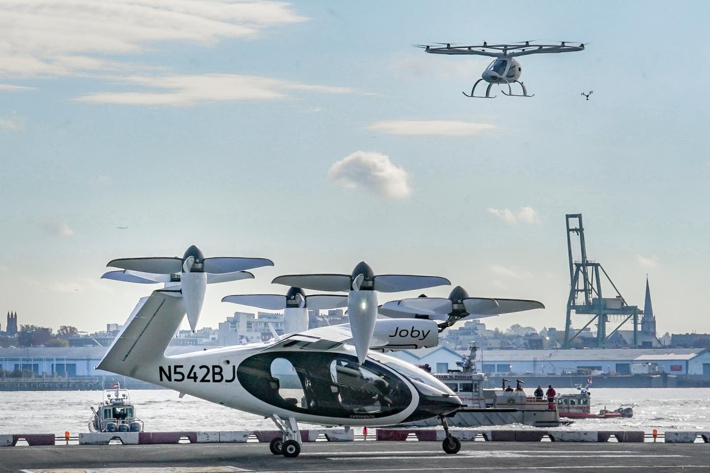 Air taxis sit on a helipad