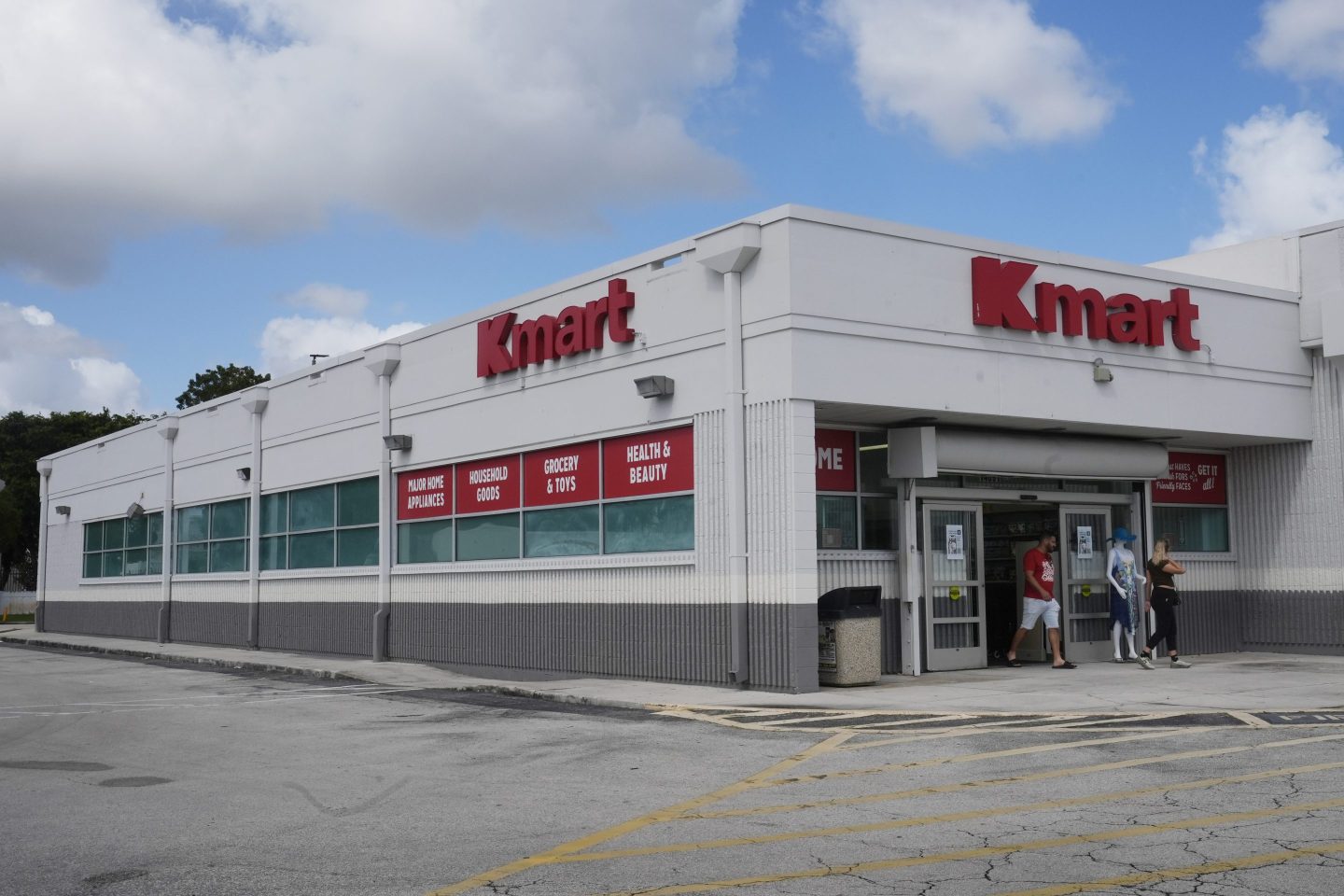 Customers leave from the only Kmart store left in the continental United States, on Oct. 22, 2024, in Miami.