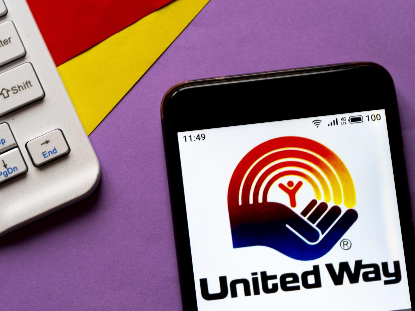 In this photo illustration a United Way of America logo seen displayed on a smartphone.