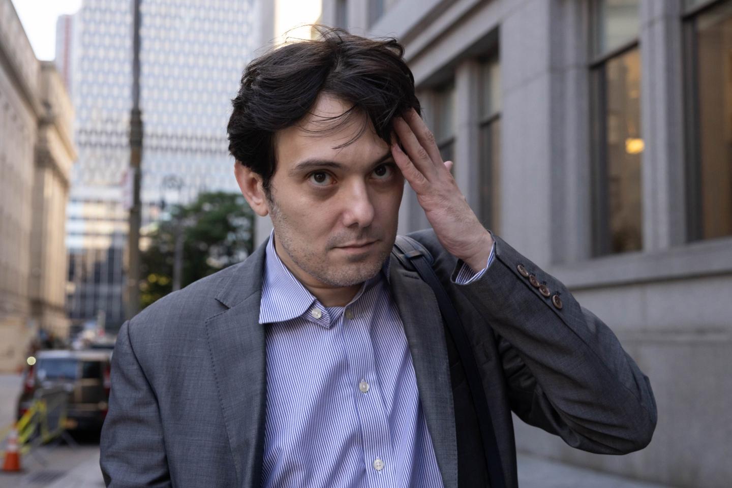 Martin Shkreli holds his head, as if he knows how much of a headache it's going to be to convince the Supreme Court to overturn his case