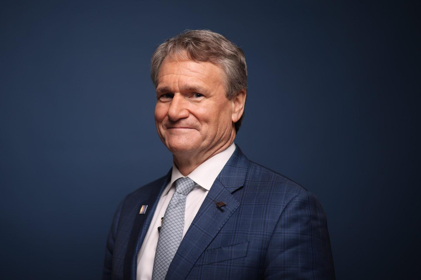 Brian Moynihan smiles at camera.
