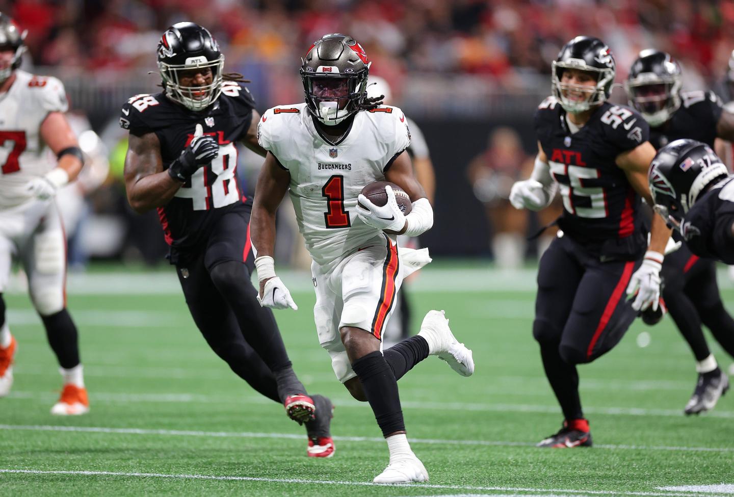 Rachaad White #1 of the Tampa Bay Buccaneers returns against the Atlanta Falcons during the second half at Mercedes-Benz Stadium on December 10, 2023 in Atlanta, Georgia.