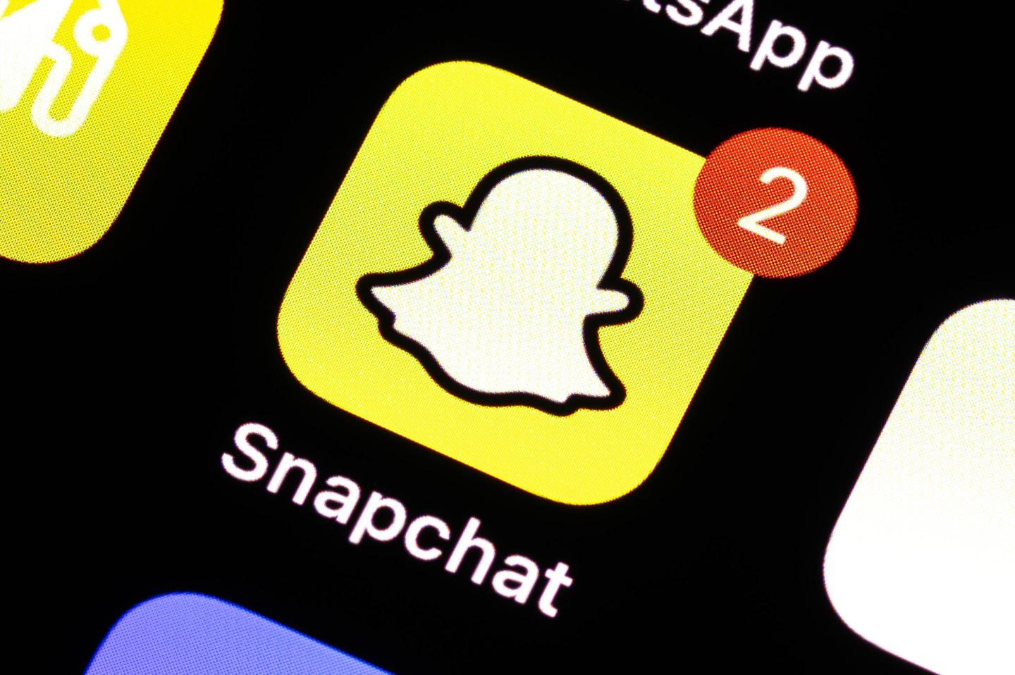 The Snapchat app can be seen on the display of a smartphone.