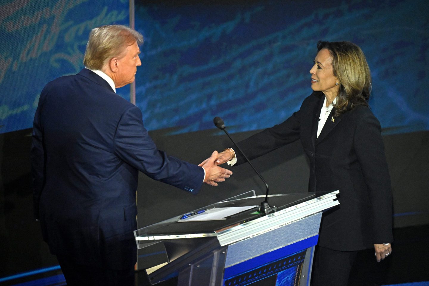 Kamala Harris and Donald Trump shake hands