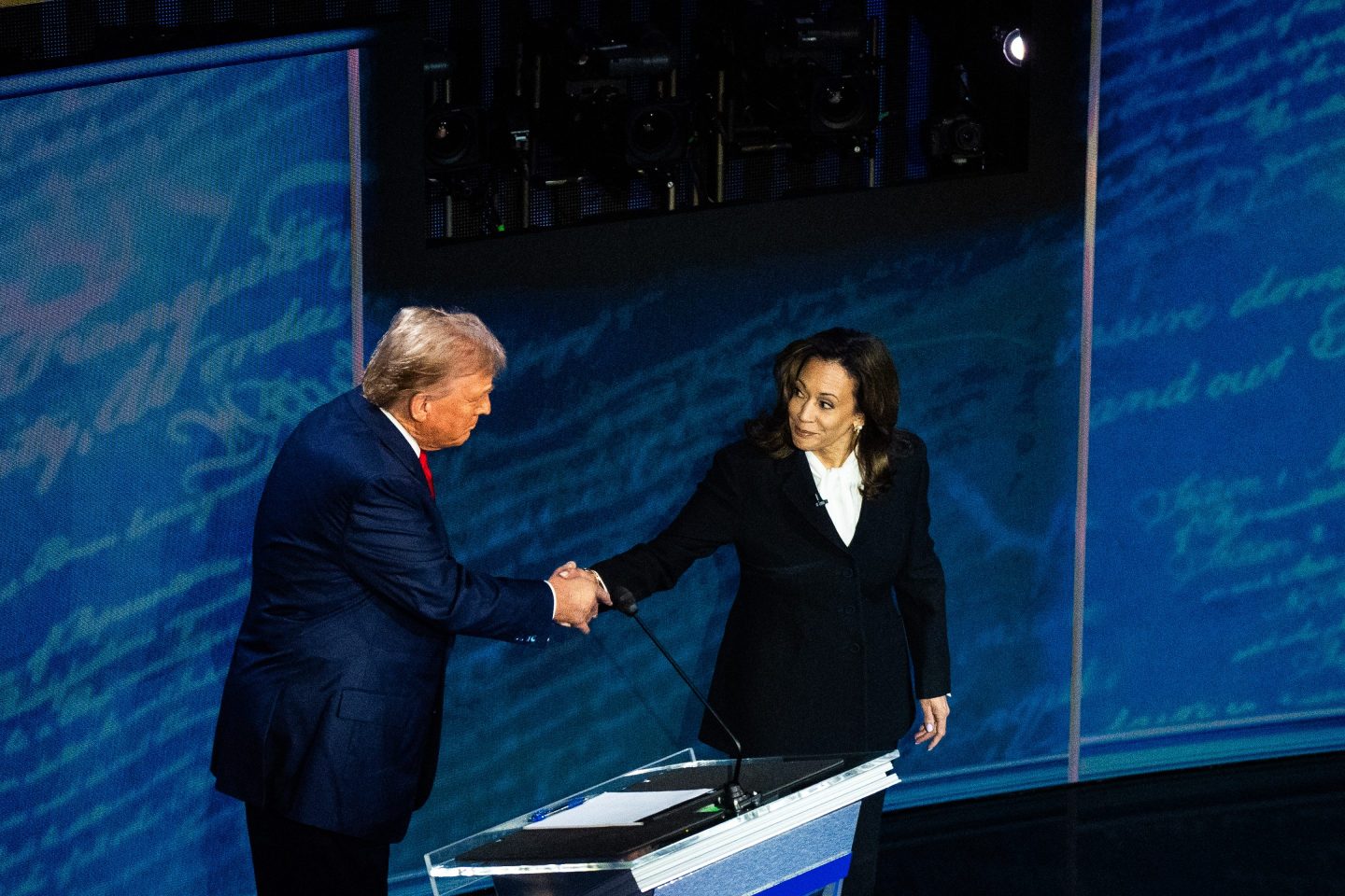 Donald Trump and Kamala Harris shake hands prior to their televised debate