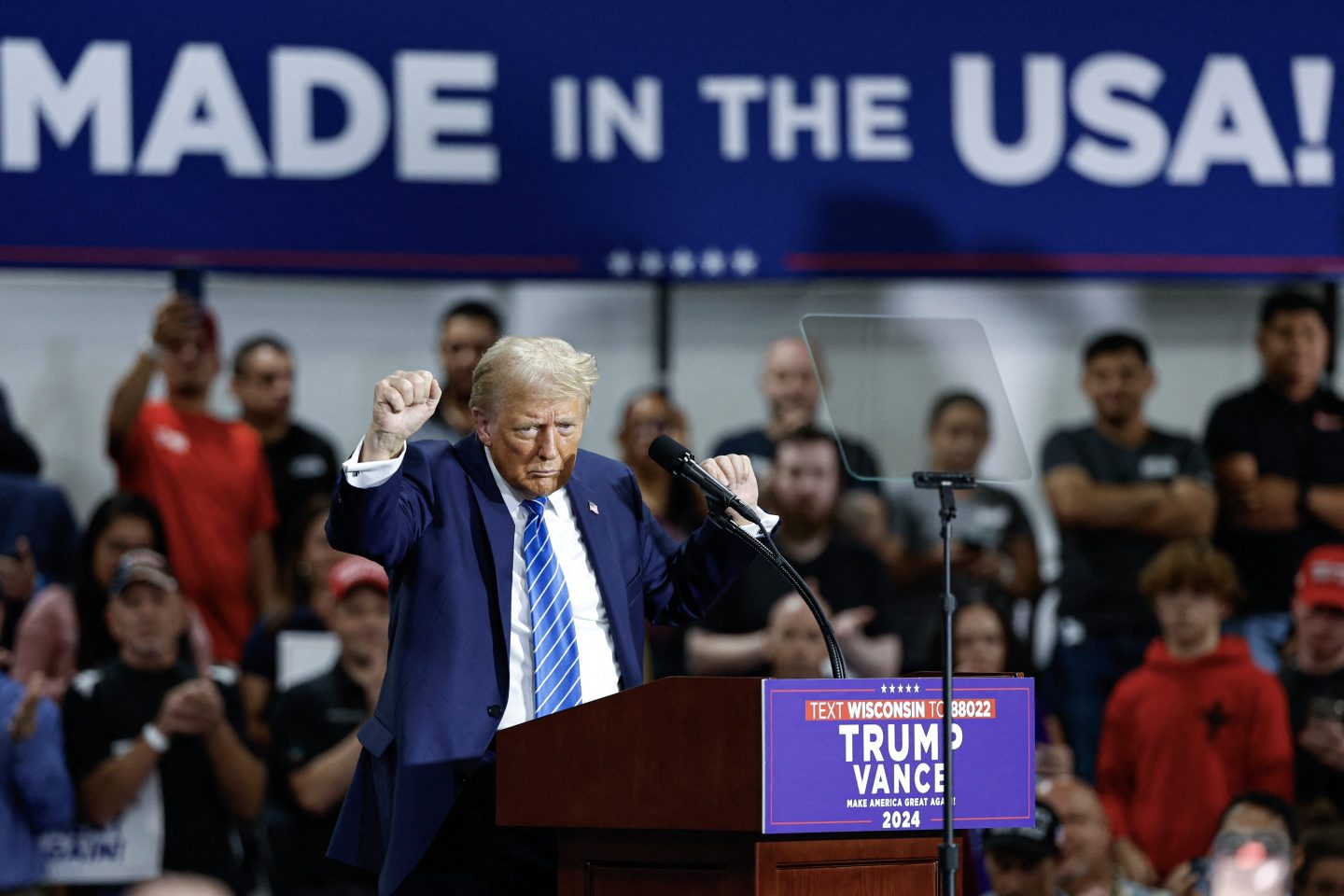 Former U.S. President and Republican presidential candidate Donald Trump dances as he concludes his remarks during a campaign event at in Wisconsin on Oct. 1.