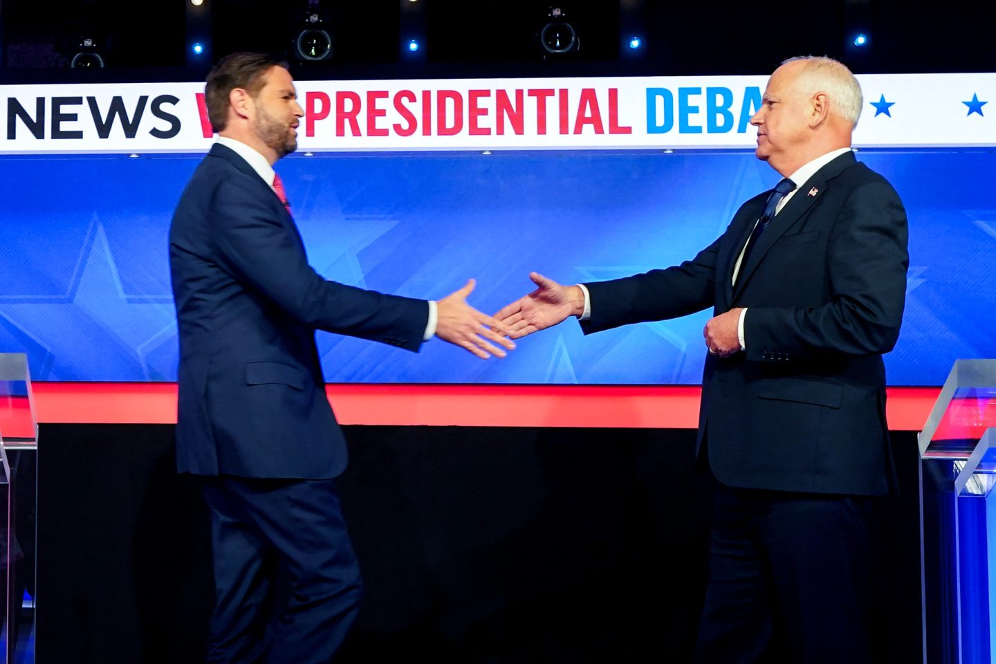 Senator JD Vance, a Republican from Ohio and Republican vice-presidential nominee, left, and Tim Walz, governor of Minnesota and Democratic vice-presidential nominee, shake hands while arriving for the first vice presidential debate at the CBS Broadcast Center in New York.