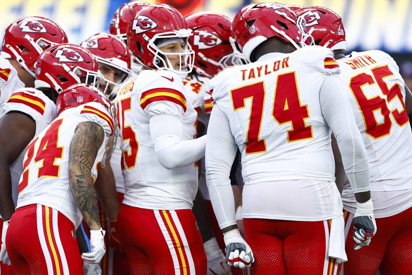 Patrick Mahomes #15 of the Kansas City Chiefs huddles with teammates during the fourth quarter against the Los Angeles Chargers at SoFi Stadium on September 29, 2024 in Inglewood, California.