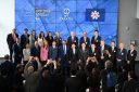 Leaders stand together for a picture at an event at the Albany NanoTech Complex in New York
