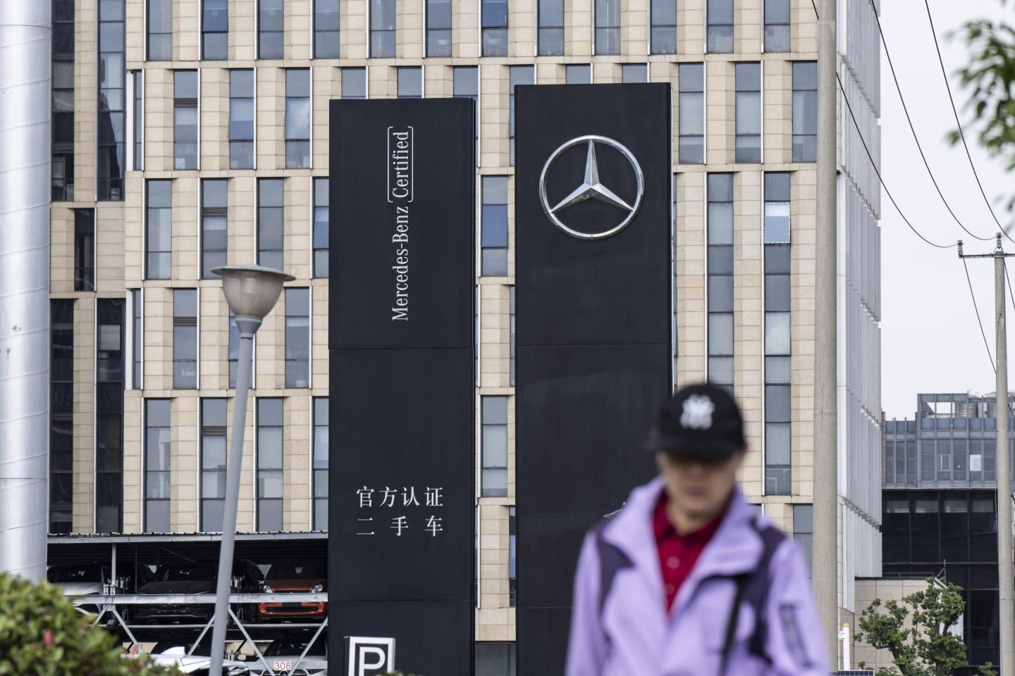 Mercedes pledges cost cuts after China slump hits margin