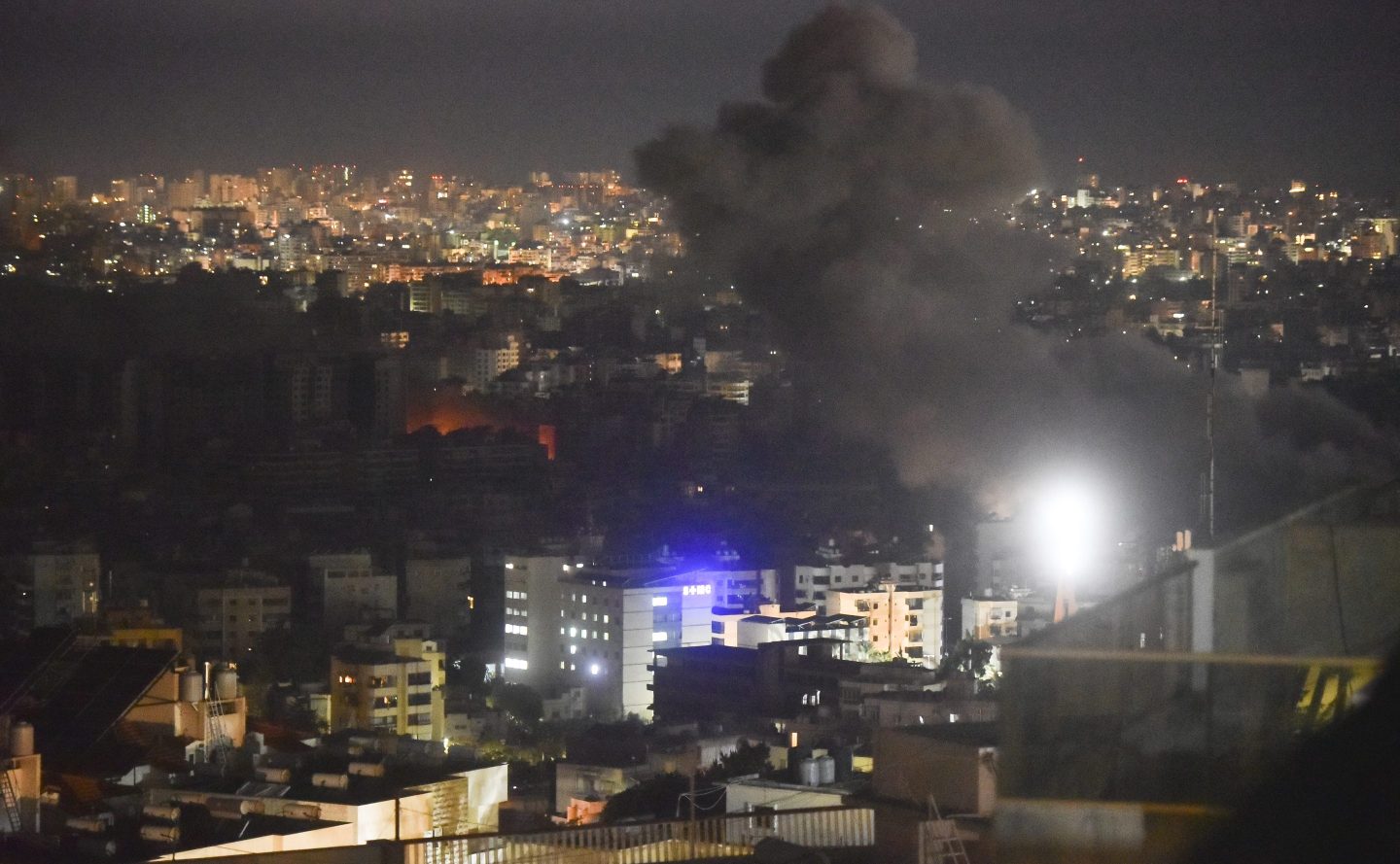 Smoke rises from the site of an Israeli airstrike that targets a neighborhood in Beirut's southern suburbs on October 25, 2024. Israel expands operations in Lebanon nearly a year after Hezbollah begins exchanging fire in support of its ally, Hamas, following the Palestinian group's deadly attack on Israel on October 7, 2023. (Photo by Fadel Itani/NurPhoto via Getty Images)