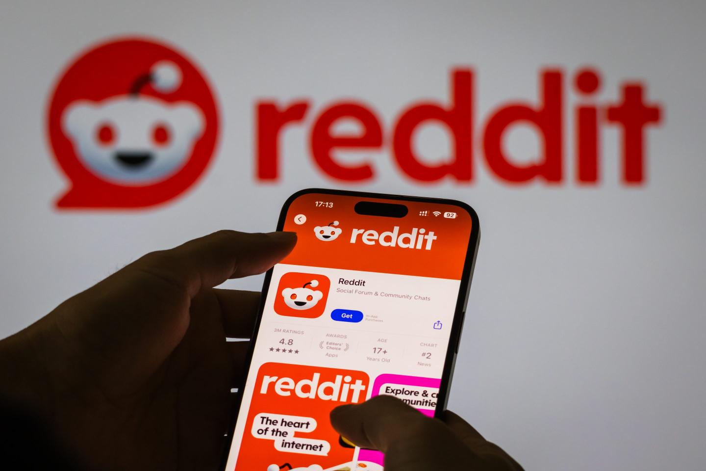 The Reddit app page is displayed on a smartphone
