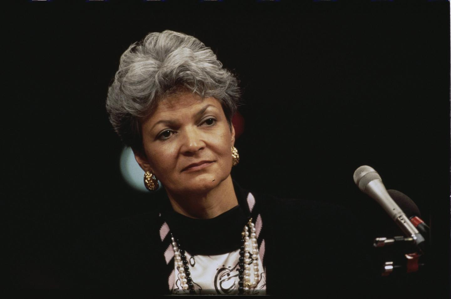Former Secretary of Energy Hazel O'Leary sits in front of a microphone.