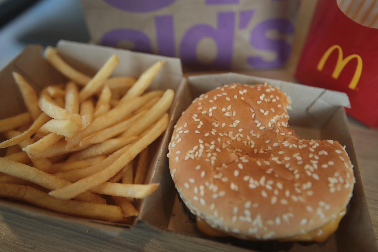 The CDC is investigating an E. coli outbreak tied to McDonald's quarter pounders, which has infected nearly 50 people. 