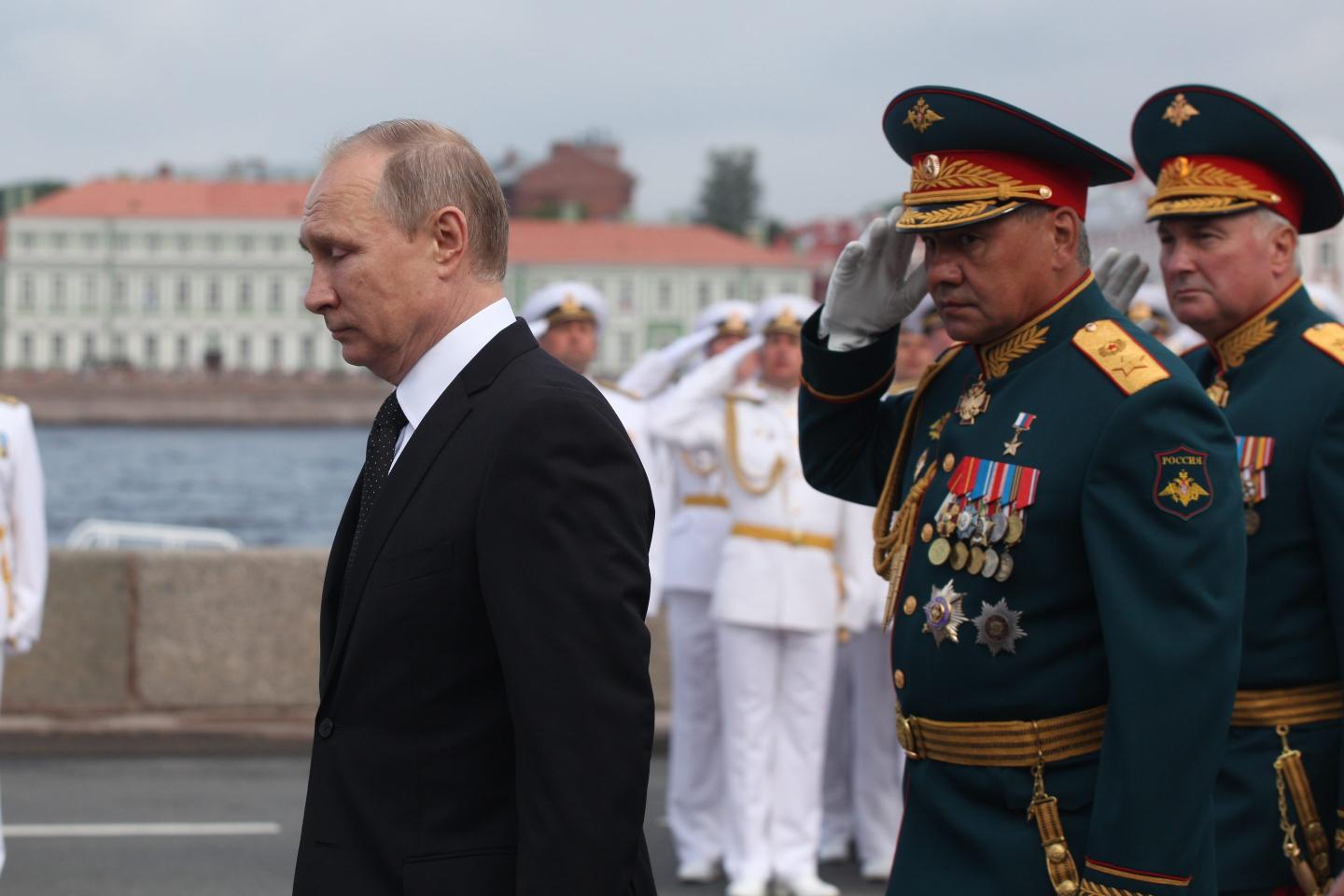 Vladimir Putin attends military parade