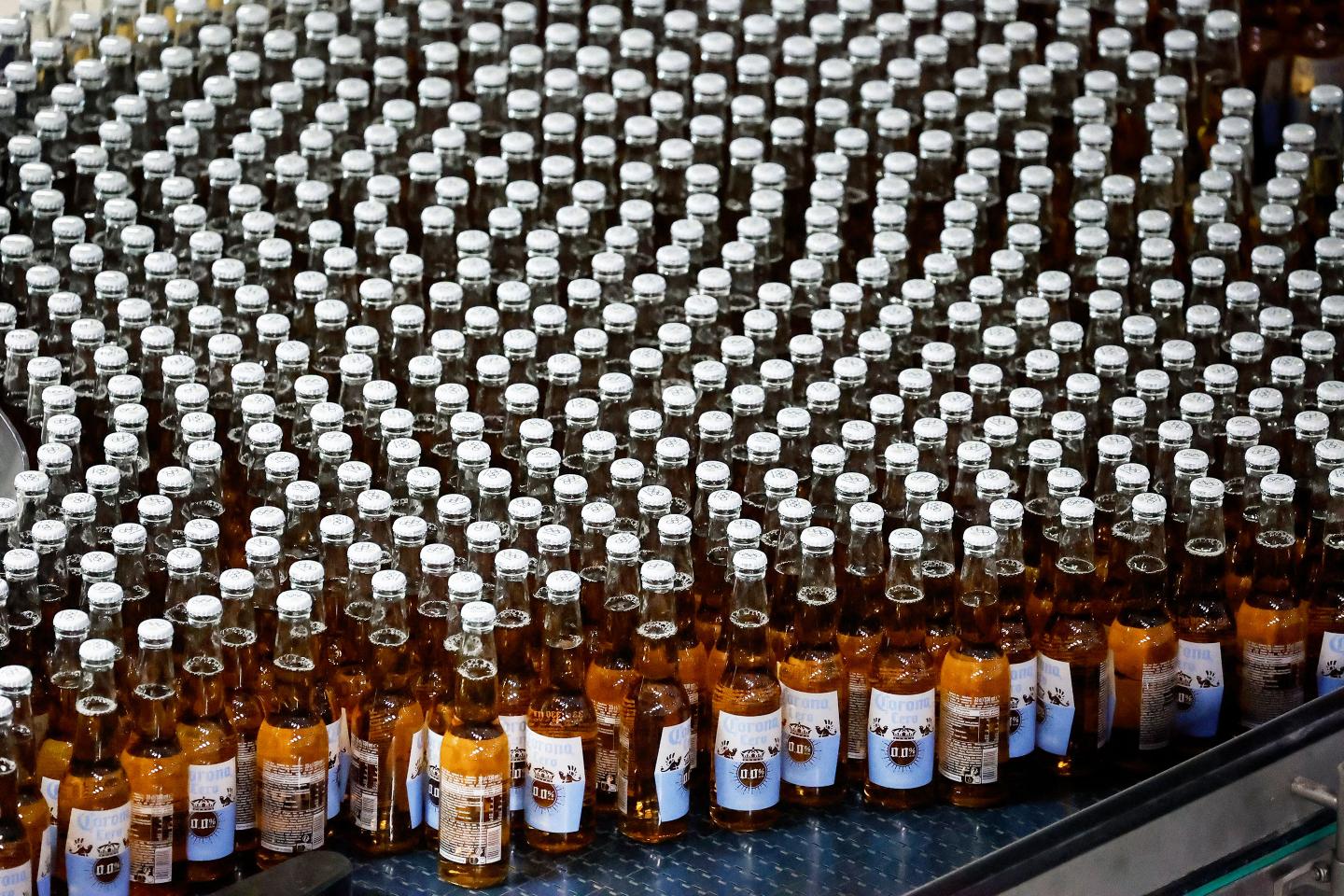 Bottles of Corona Cero alcohol-free beer move on a production line