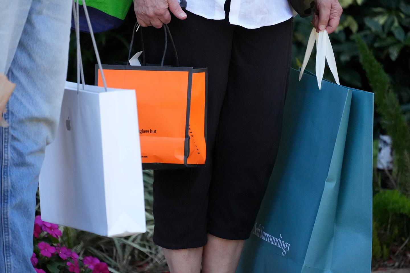 A woman holding shopping bags