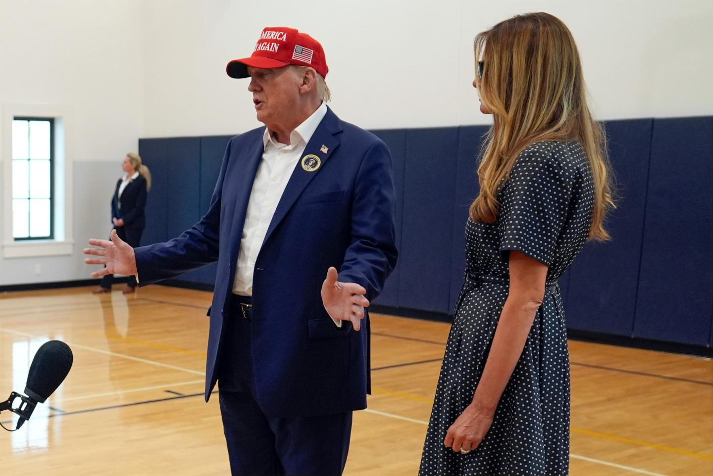 Donald and Melania Trump appear together.