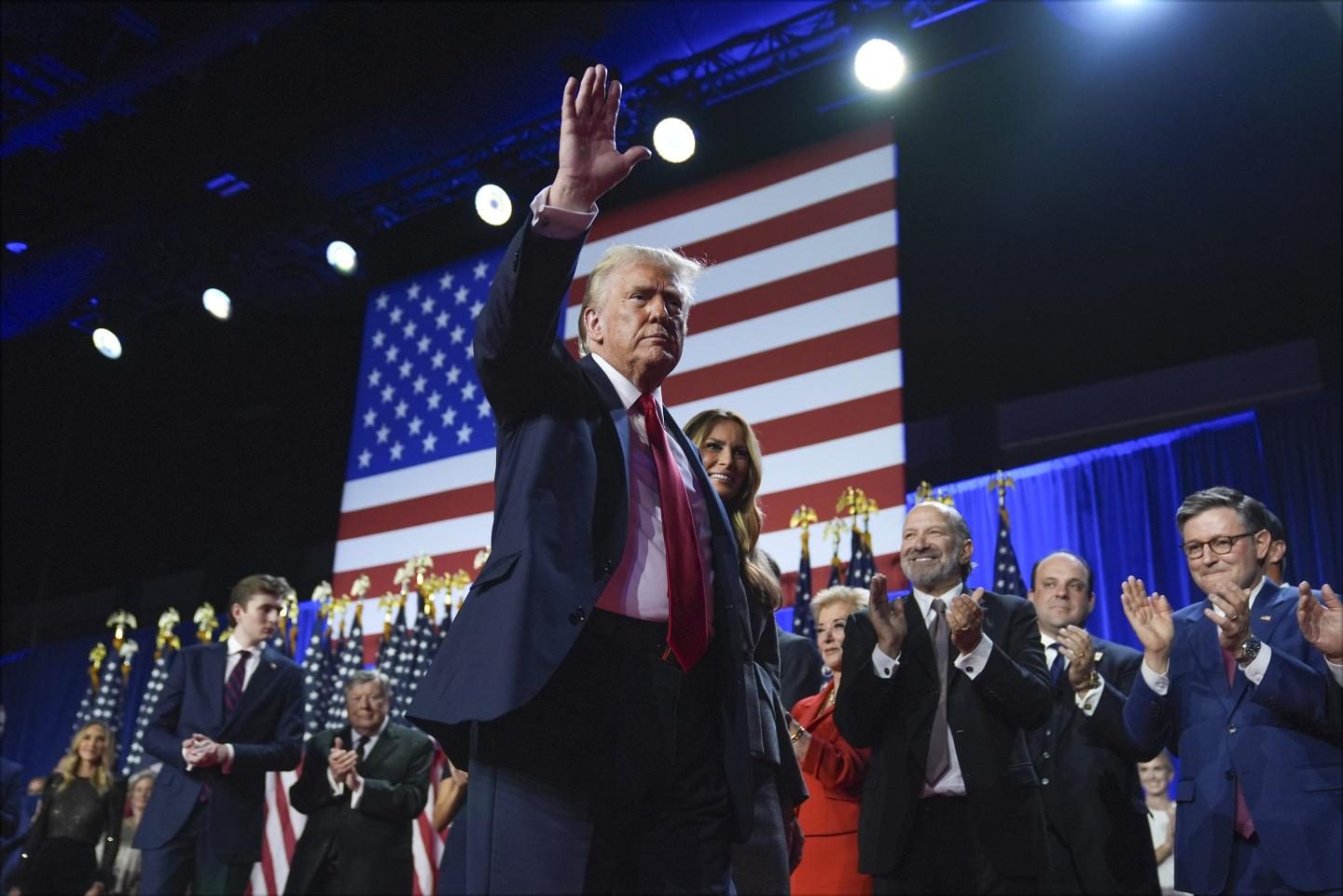 Trump waves to a crowd.