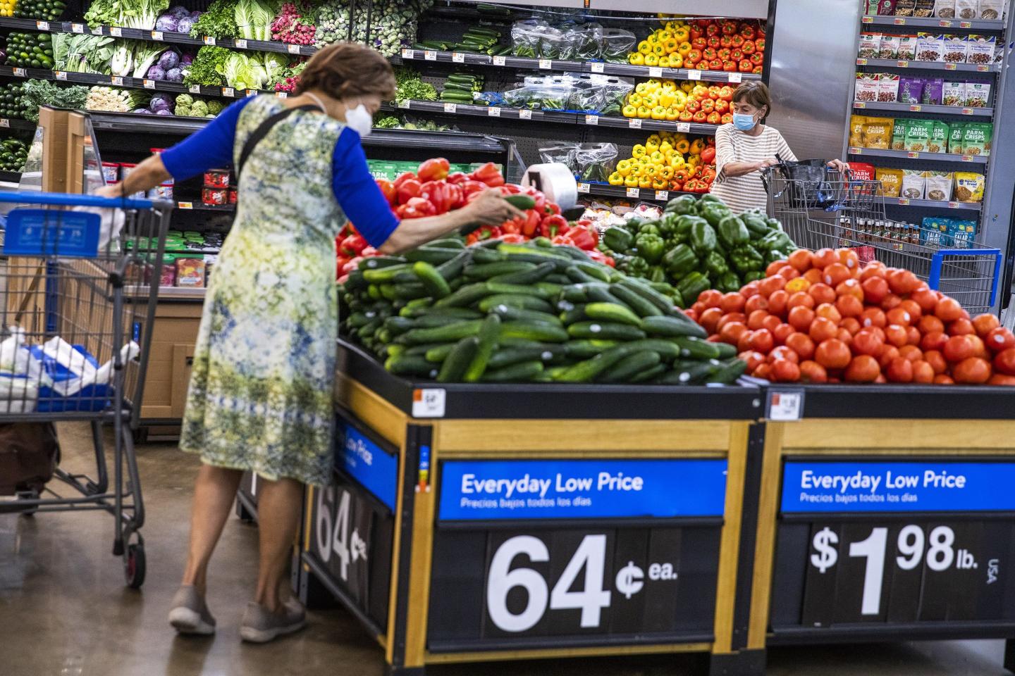 Walmart shares rise on third quarter jump in sales and profits as low prices attract inflation-hit Americans