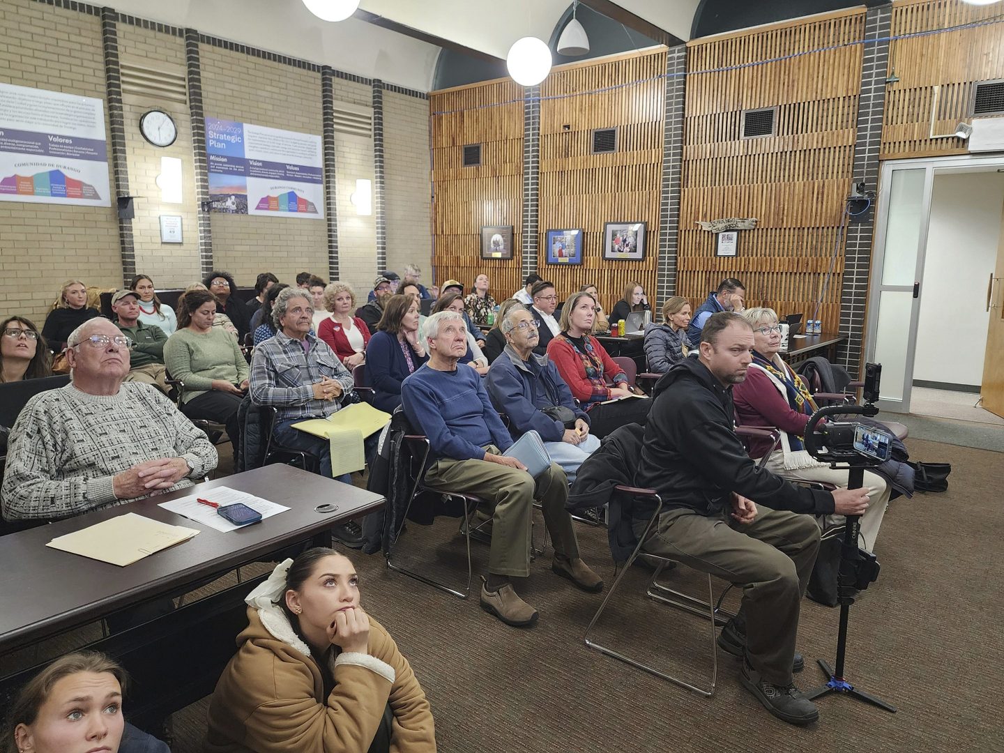 Residents attend a Durango City Council meeting to speak about the continued fluoridation of the city's drinking water, Nov. 5, 2024, in Durango, Colo.