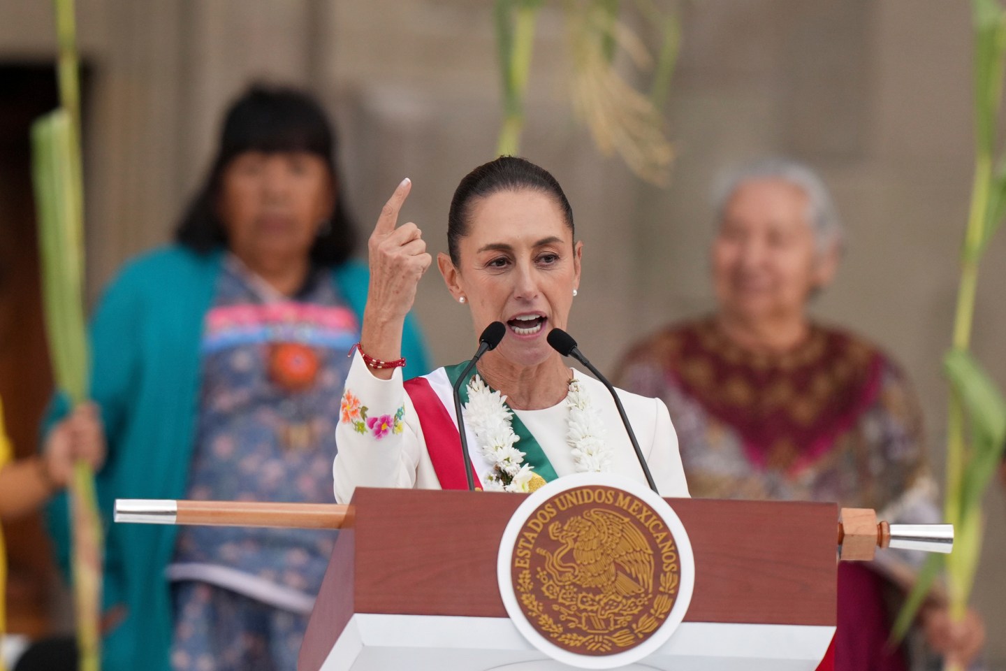 Newly-sworn in President Claudia Sheinbaum addresses supporters in the Zócalo, Mexico City's main square, on Oct. 1, 2024.