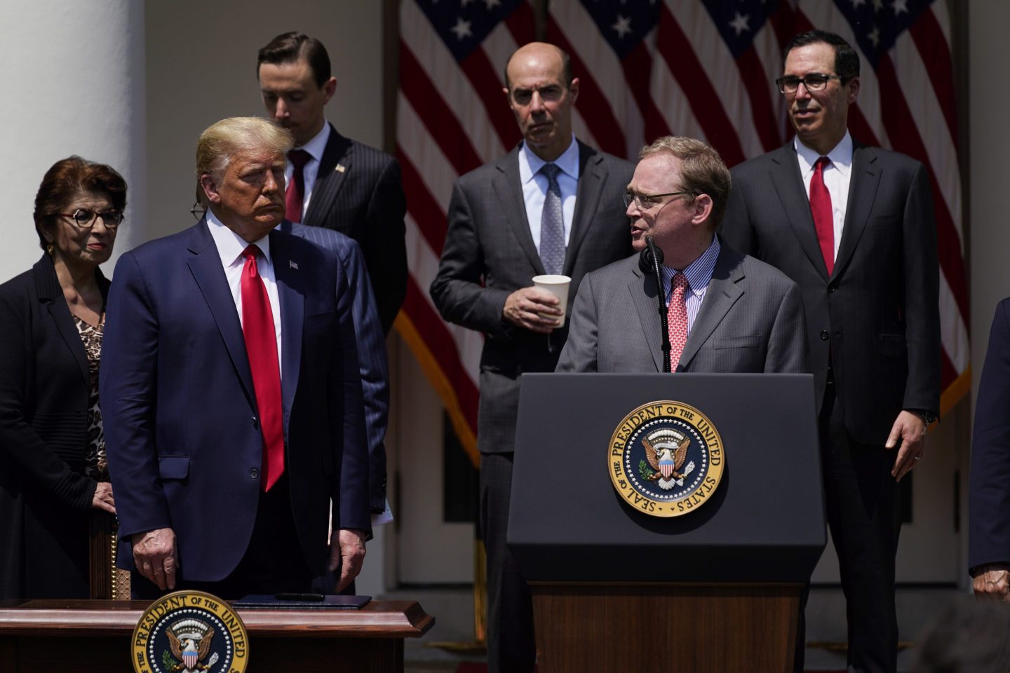 White House senior adviser Kevin Hassett speaks as President Donald Trump and others listen during a news conference in the Rose Garden of the White House, June 5, 2020, in Washington.