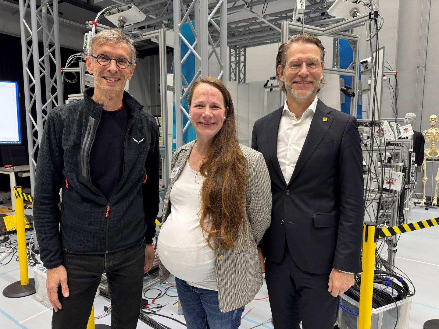 Michael Black of Meshcapade and the Max Planck Institute (L), with Cyber Valley managing director Rebecca Reisch, and Florian Stegmann, head of the chancellery in the German state of Baden-Württemberg.