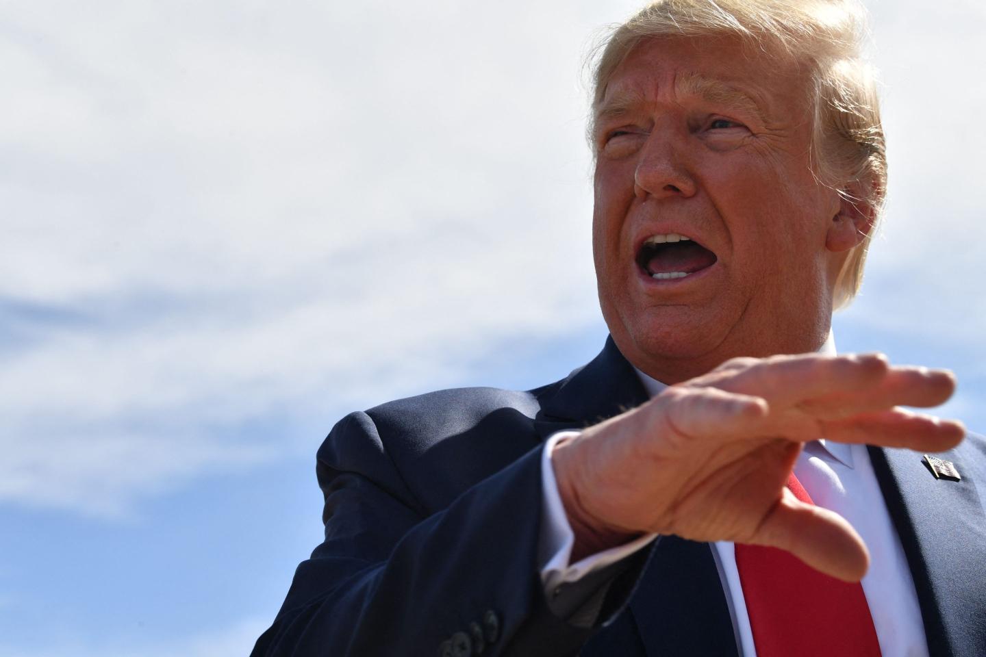 US President Donald Trump speaks as he arrives at Naval Air Station Joint Reserve Base Forth Worth in Texas on October 17, 2019.