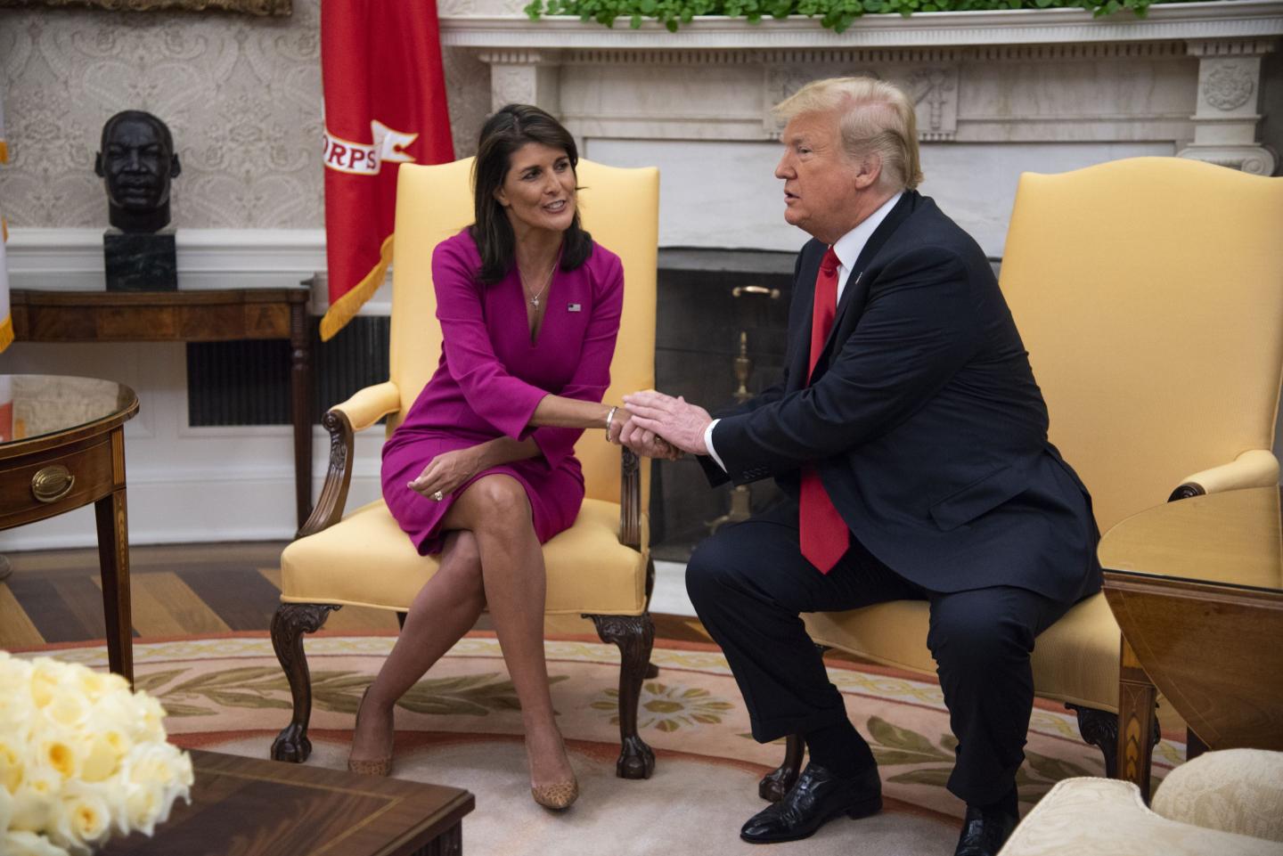 Nikki Haley and Donald Trump shake hands
