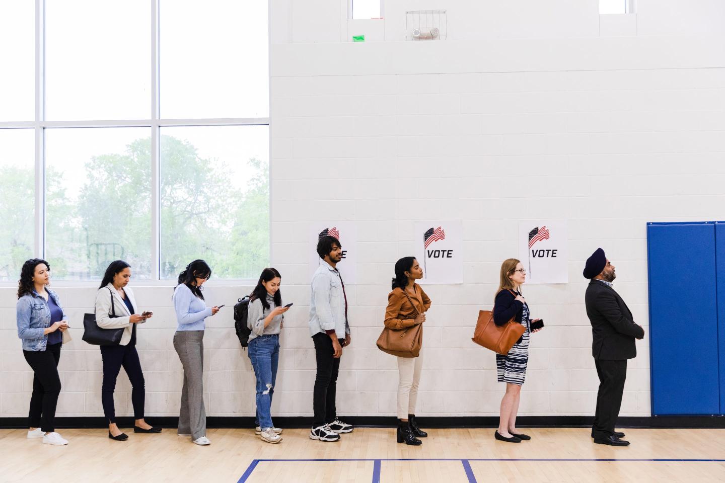 U.S. citizens in line waiting to vote.